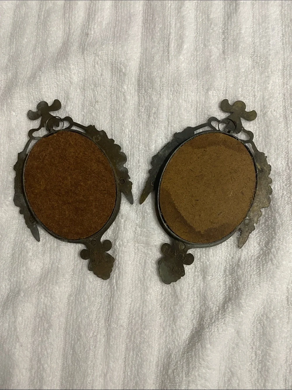 Ornate Vintage-Style Wall Plaque Set in Dark Bronze. Both two toned.